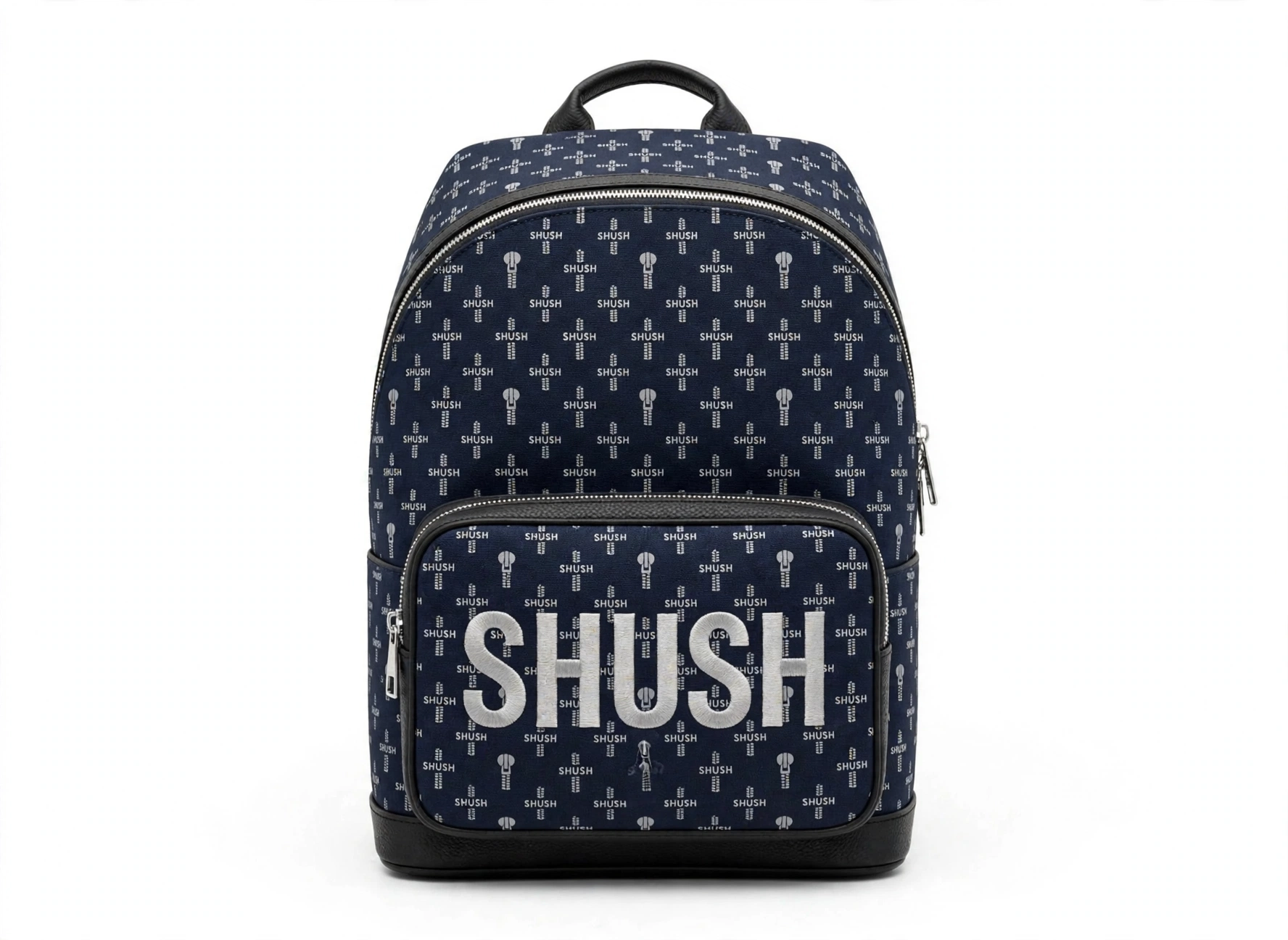SHUSH monogram backpack in Navy — all-over zipper-pull monogram print, big SHUSH embroidered in silver on the front pocket