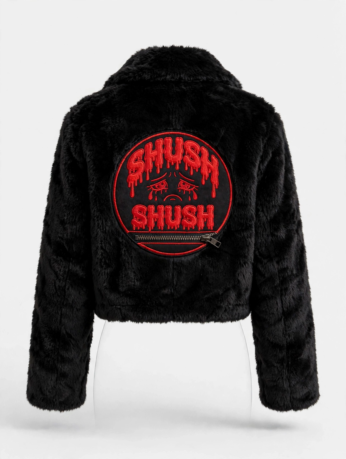Black fur coat back with the crying-eyes SHUSH emblem