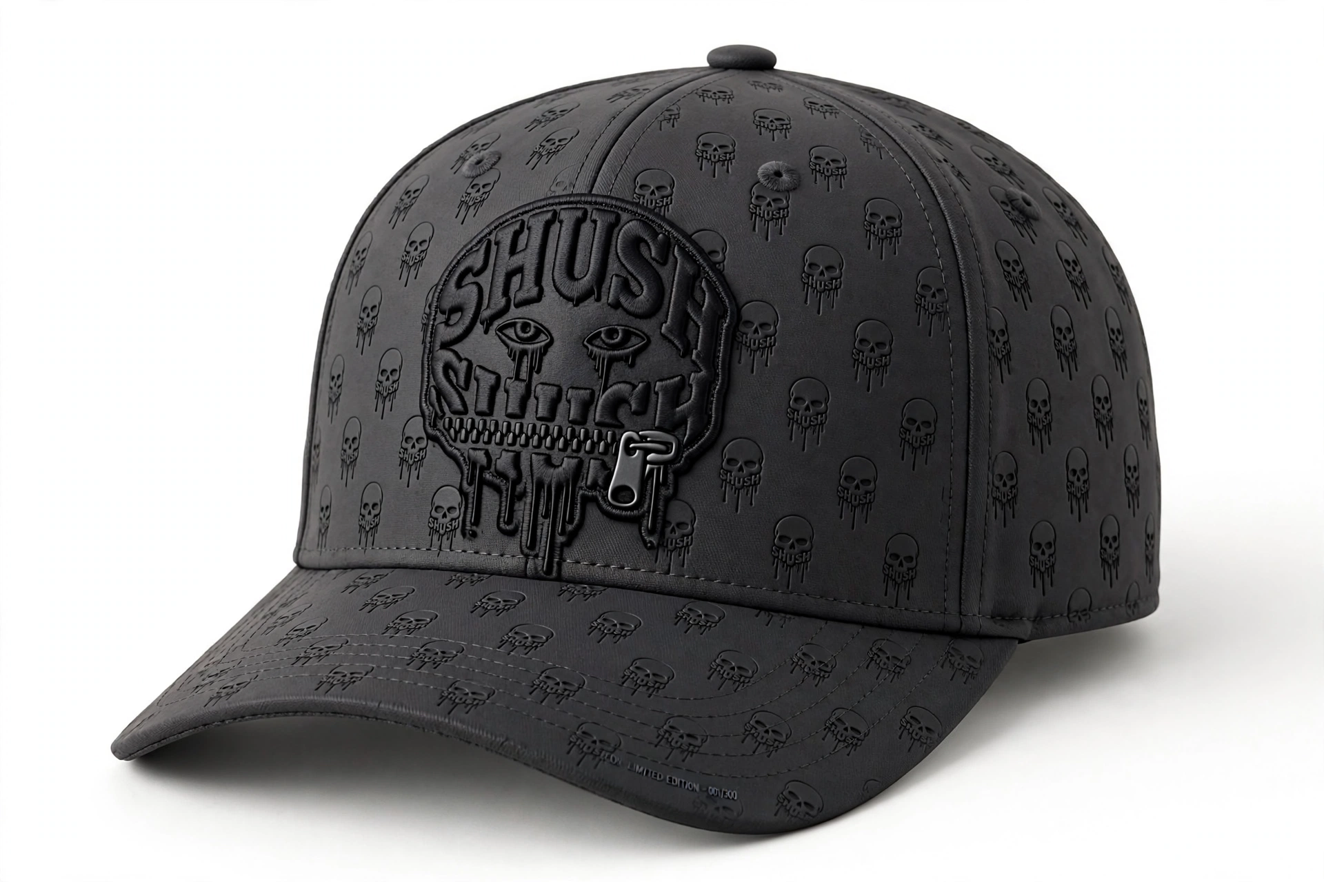 Dark charcoal grey SHUSH fitted hat with an all-over engraved black skull pattern and black SHUSH centerpiece