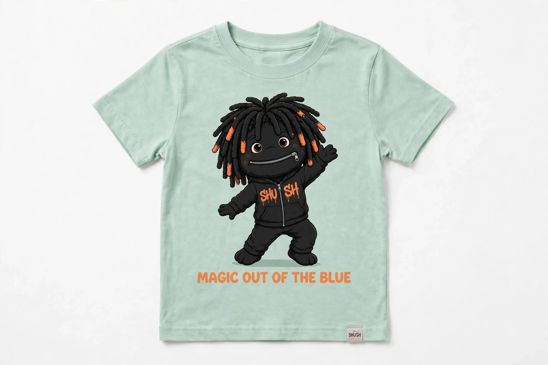 SHUSH kids Magic tee in Black — the friends printed big on the chest, Magic Out of the Blue in gold, a tiny SHUSH label at the hem